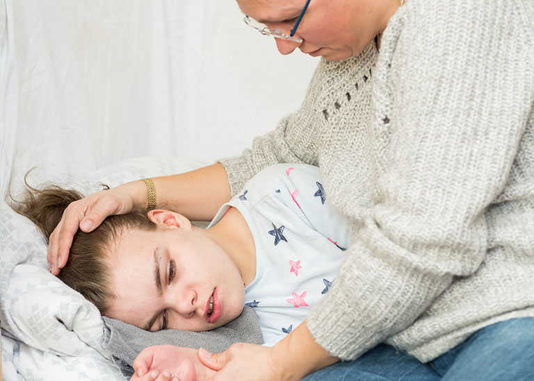 A child with epilepsy during a seizure